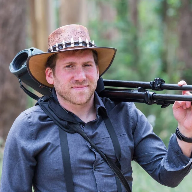 Greg Schechter in the field with camera gear